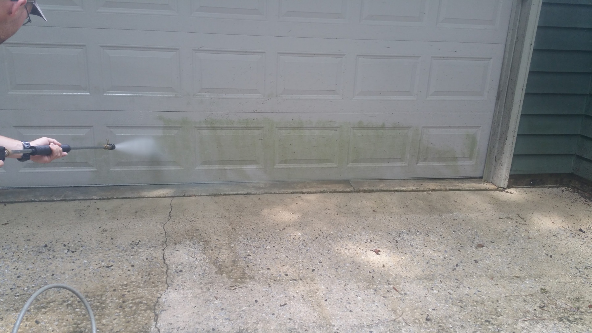 Garage door pressure washing