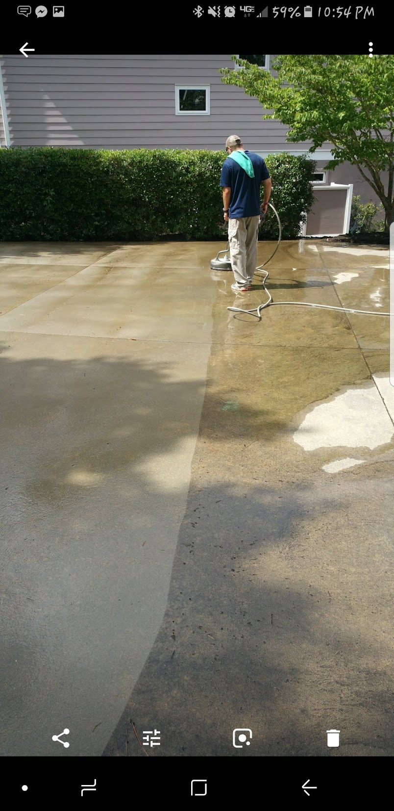 Driveway surface cleaning in progress